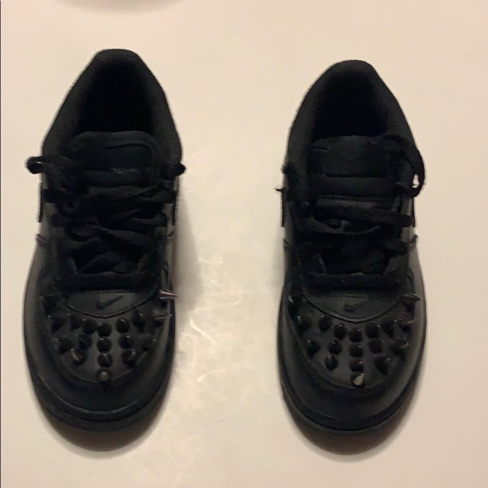 Black Air Force ones with spikes